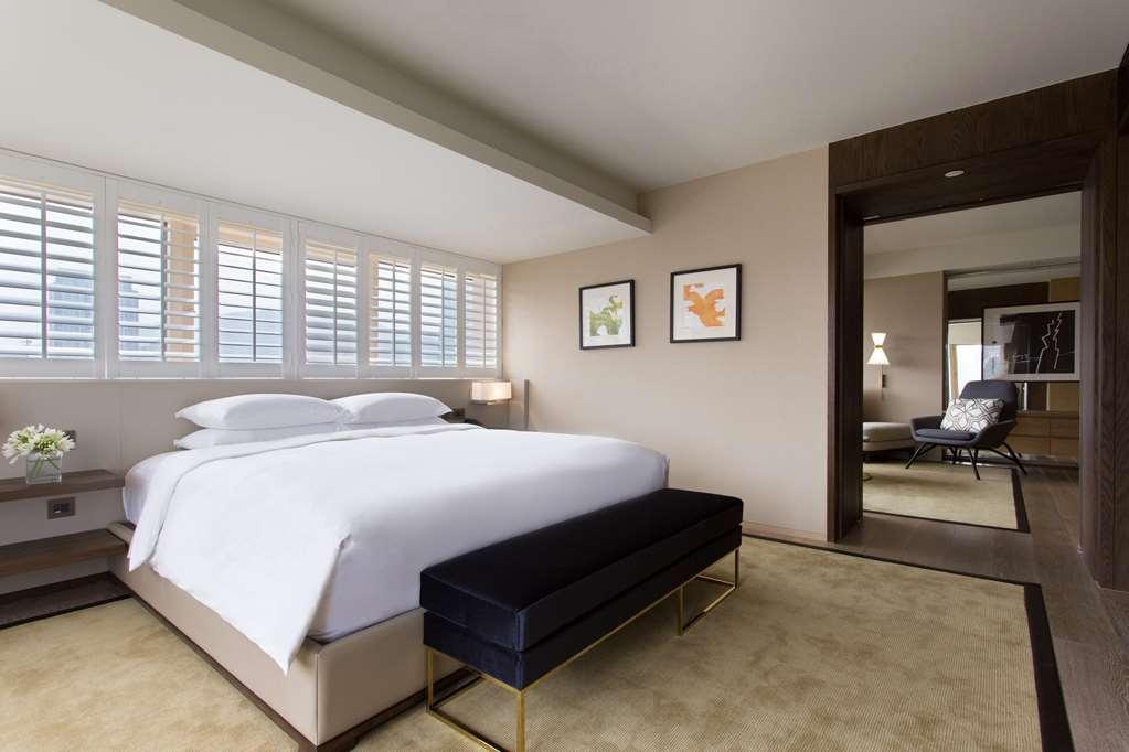 Grand Hyatt Taipei Hotel Quarto foto A bedroom at the hotel