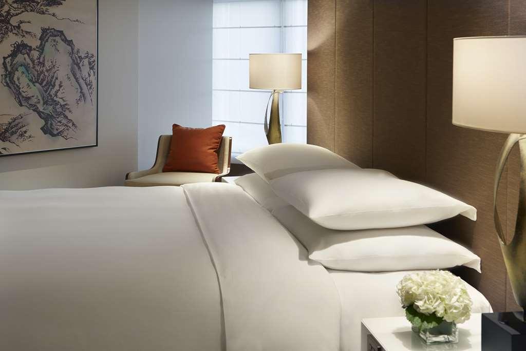 Grand Hyatt Taipei Hotel Quarto foto A guest room at the Four Seasons Hotel